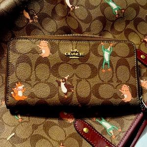COACH F87885 ACCORDION ZIP WALLET SIGNATURE CANVAS WITH PARTY ANIMALS PRINT